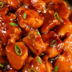 This Easy 20 Minute Bourbon Chicken is a copycat of the Chinese mall food classic: tender chicken coated in a tangy, sticky sauce with sweet and savory flavors. It’s an easy weeknight dinner that’s irresistible down to the last bite!