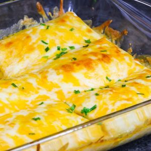 This Cheesy Burrito Casserole is the ultimate homemade Tex Mex recipe. It's loaded with beef, beans, onions, corn and seasonings for a mouthwatering meal