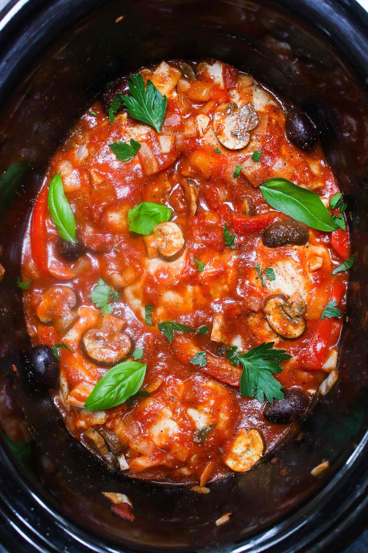 This easy and healthy Crock Pot Chicken Cacciatore is a tender and flavorful Italian chicken dinner recipe made in a slow cooker. Chicken thighs or chicken breasts are simmered in a rich and mouth-watering cacciatore sauce, absorbing all the delicious flavors!