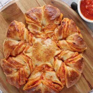 This stunning Pull Apart Pizza Braid is a delicious party appetizer thats perfect for sharing